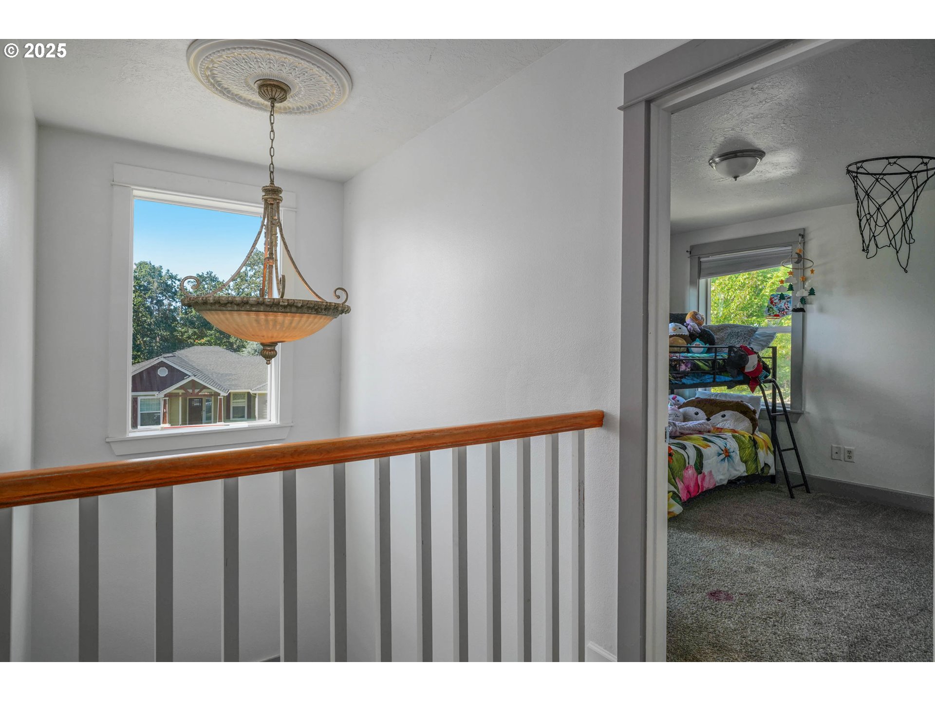466 Northwest Denton Avenue Dallas, OR 97338 - Photo 22 of 43 a view of a hallway to a livingroom
