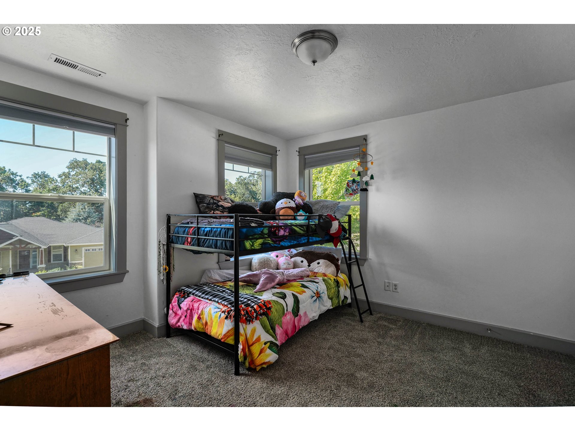 466 Northwest Denton Avenue Dallas, OR 97338 - Photo 23 of 43 a bedroom with furniture and a window