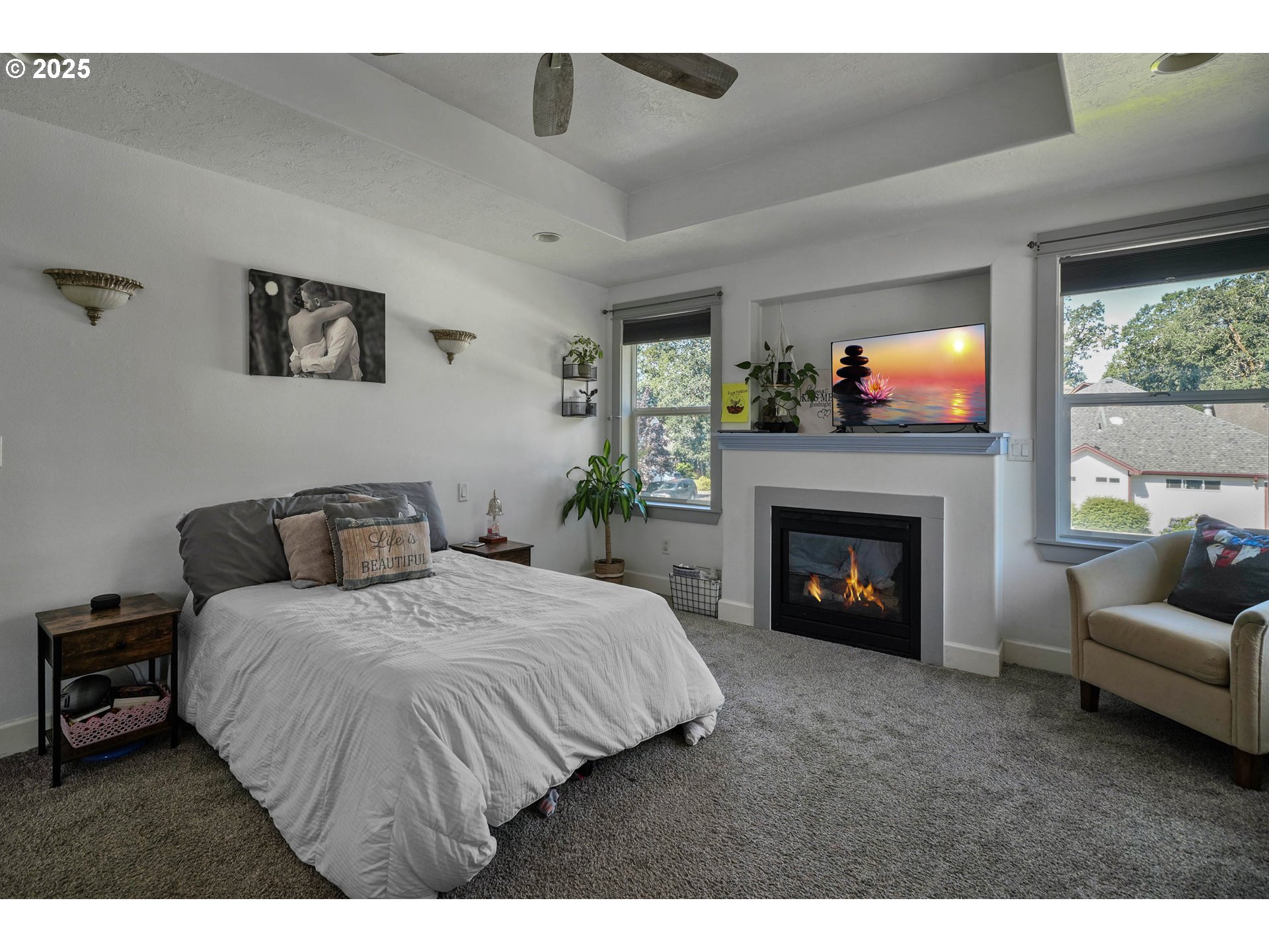 466 Northwest Denton Avenue Dallas, OR 97338 - Photo 24 of 43 a bedroom with a bed and a fireplace