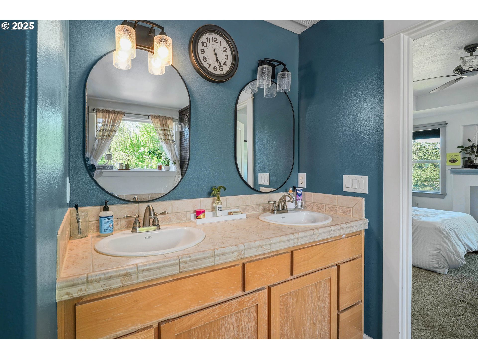466 Northwest Denton Avenue Dallas, OR 97338 - Photo 26 of 43 a bathroom with a sink and a mirror