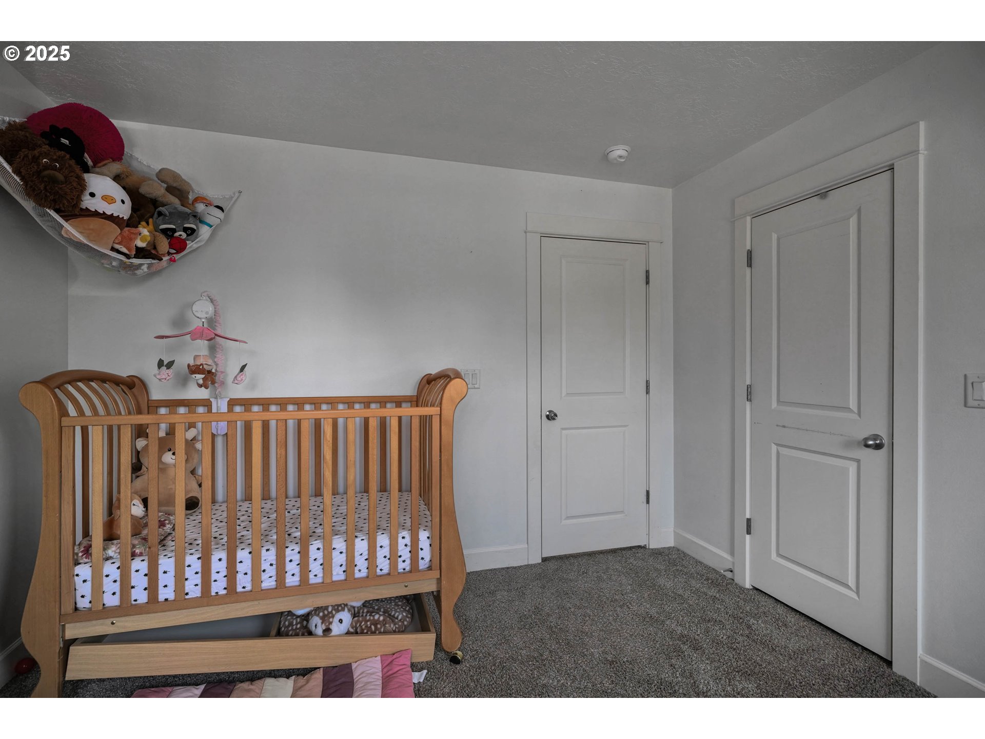 466 Northwest Denton Avenue Dallas, OR 97338 - Photo 30 of 43 a bedroom with furniture and a window