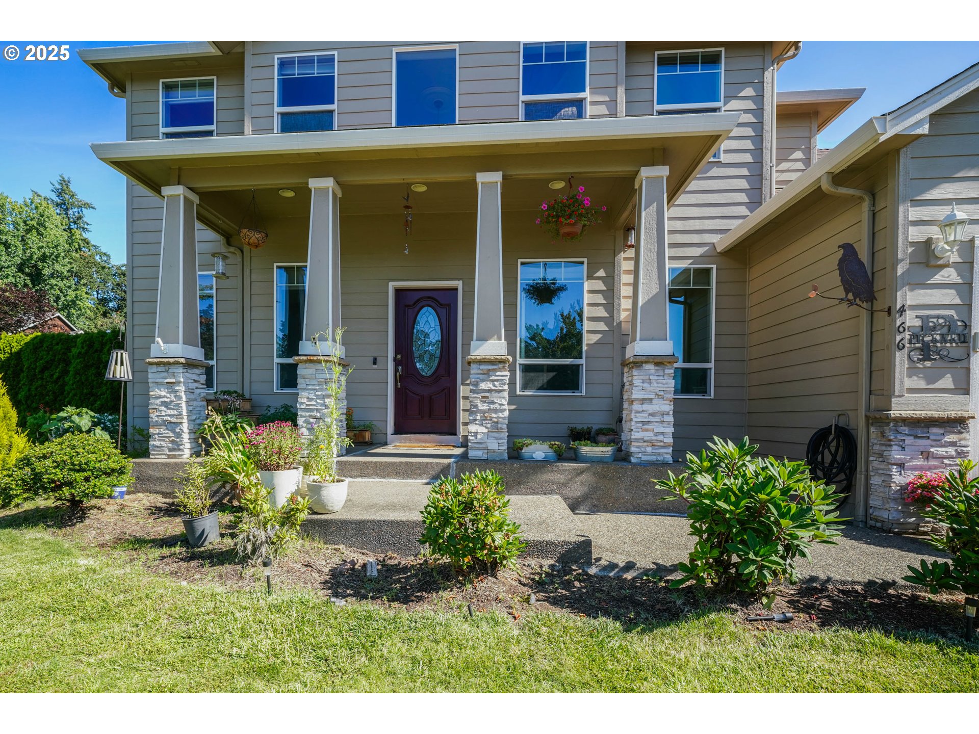 466 Northwest Denton Avenue Dallas, OR 97338 - Photo 3 of 43 a view of a house with potted plants