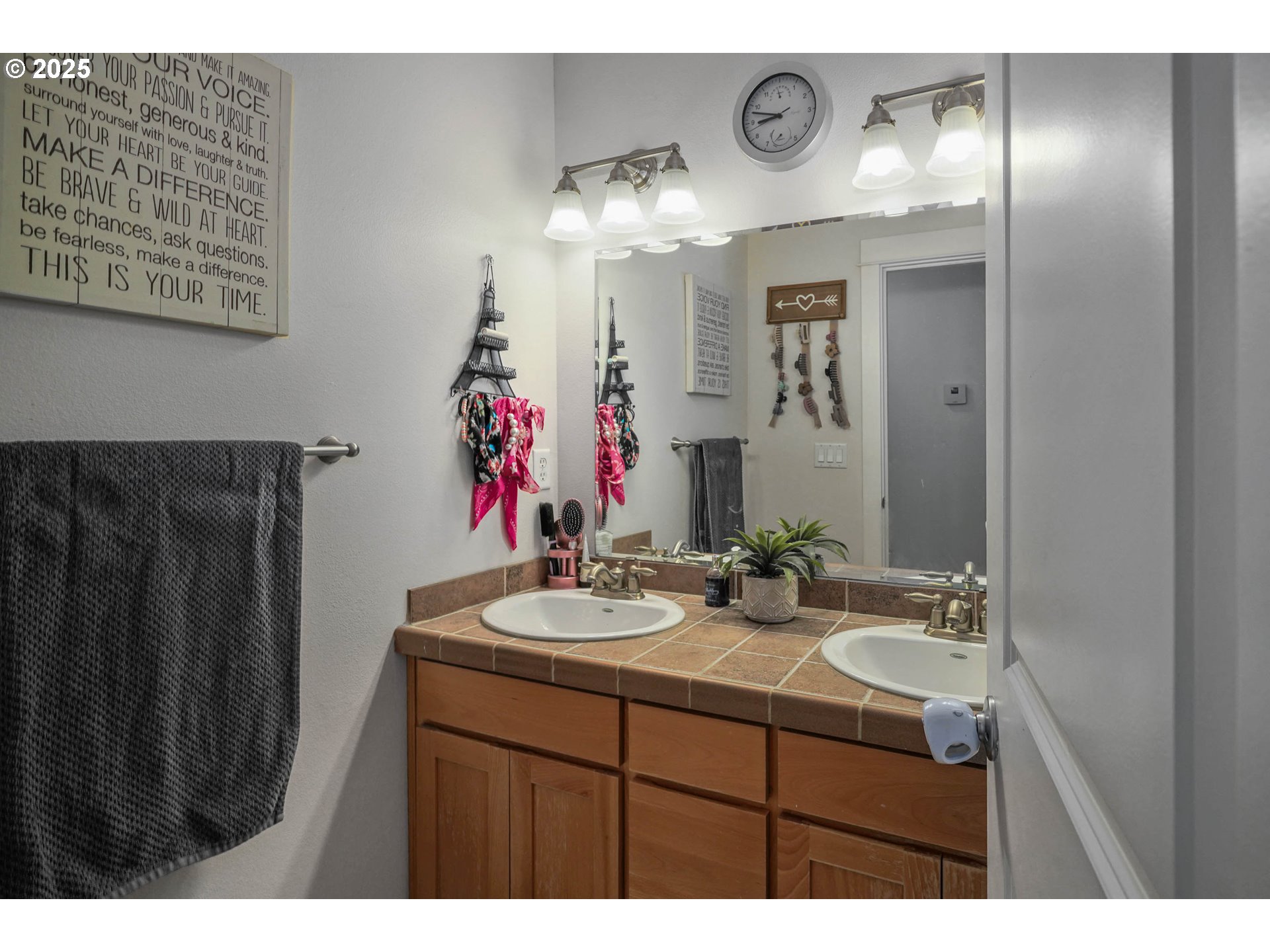 466 Northwest Denton Avenue Dallas, OR 97338 - Photo 31 of 43 a bathroom with a sink and a mirror
