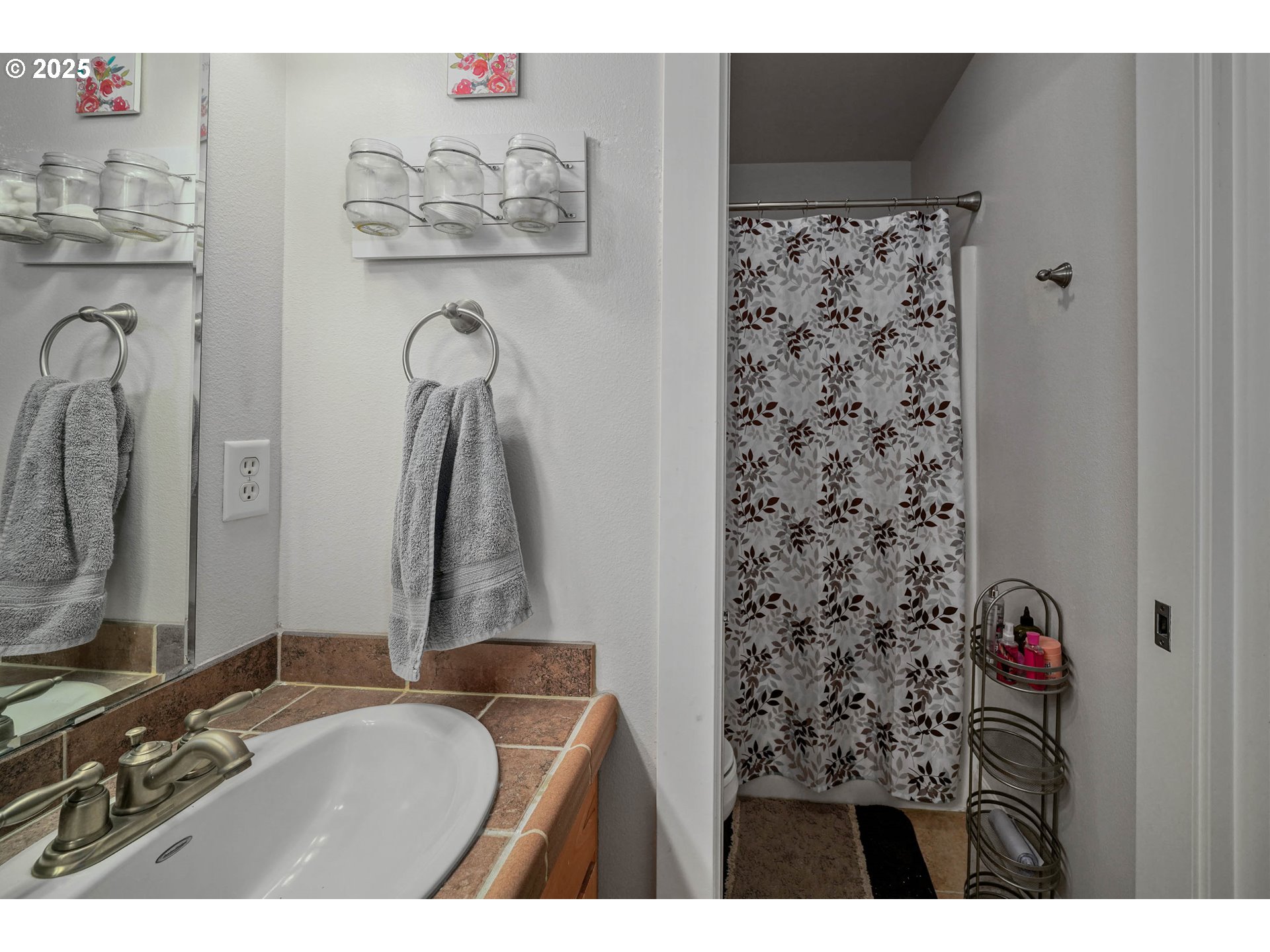 466 Northwest Denton Avenue Dallas, OR 97338 - Photo 33 of 43 a bathroom with a sink and a mirror