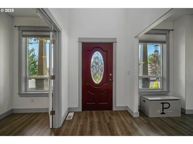 a picture of window with wooden floor