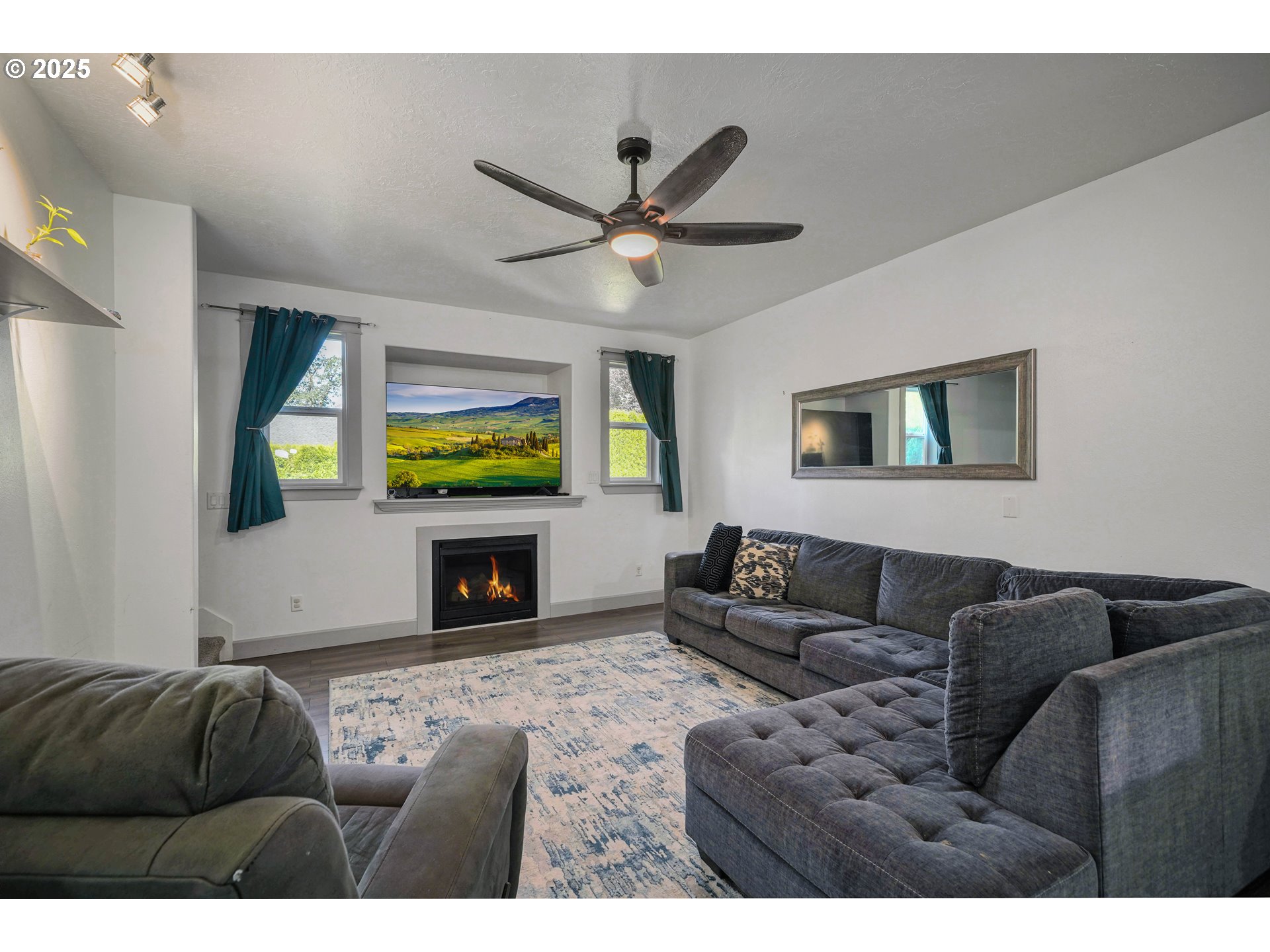 466 Northwest Denton Avenue Dallas, OR 97338 - Photo 6 of 43 a living room with furniture and a fireplace