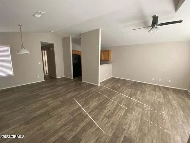 a view of a livingroom with a staircase
