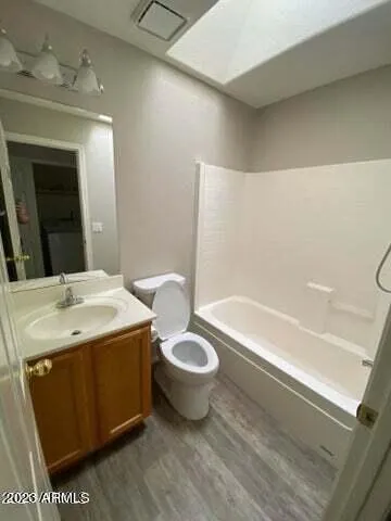 a bathroom with a sink and mirror