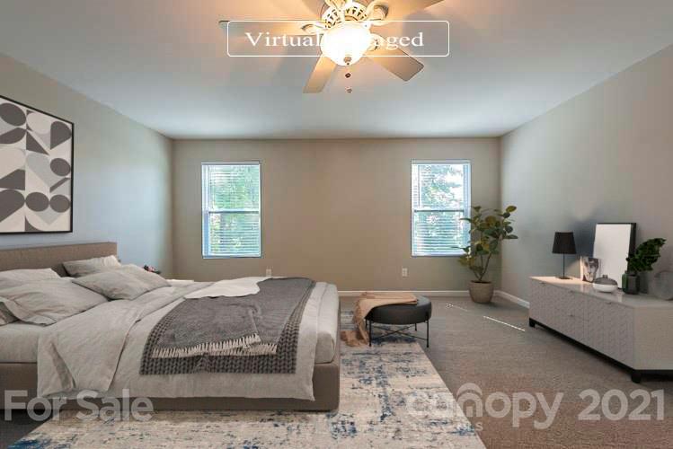 9019 Klein Road Fort Mill, SC 29715 - Photo 3 of 19 a bedroom with a bed and window