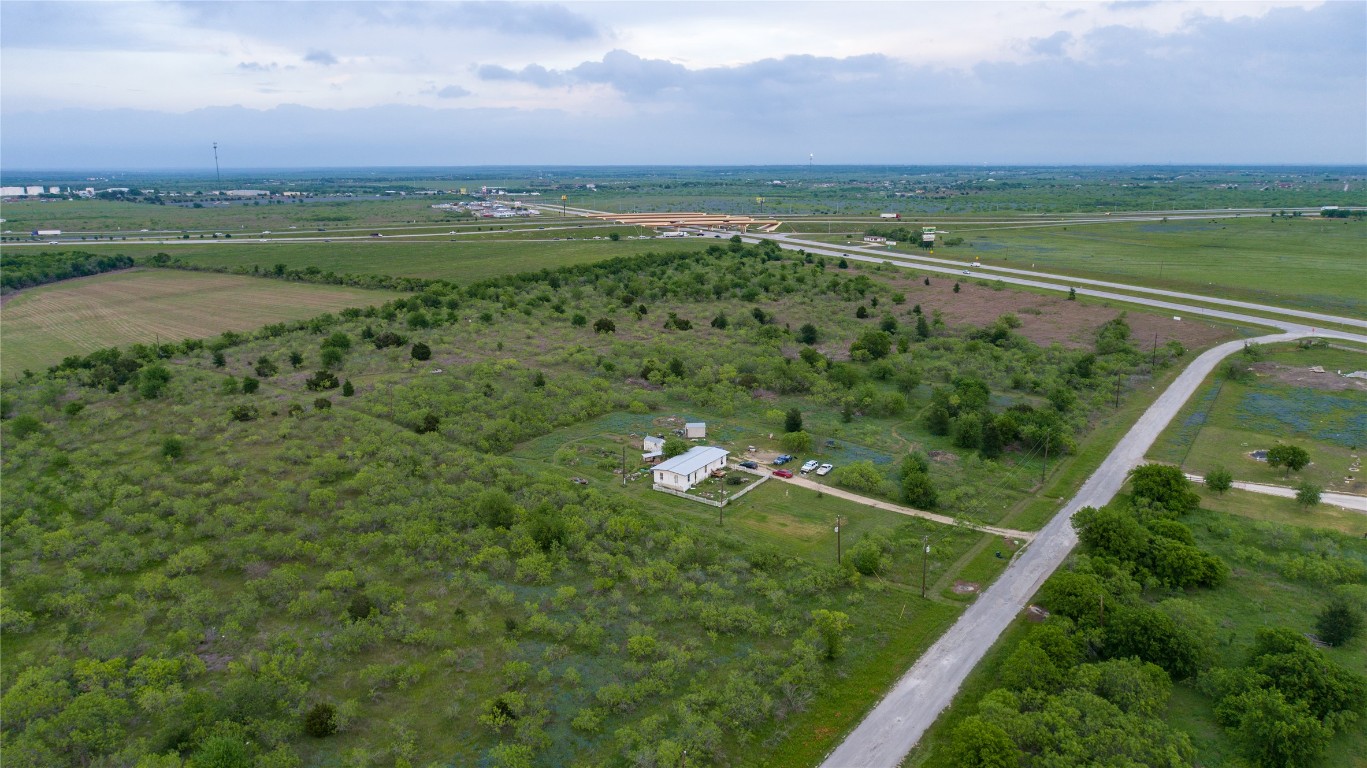 118 Ranchero Drive Buda, TX 78610 - Photo 2 of 21 a view of a city with an ocean