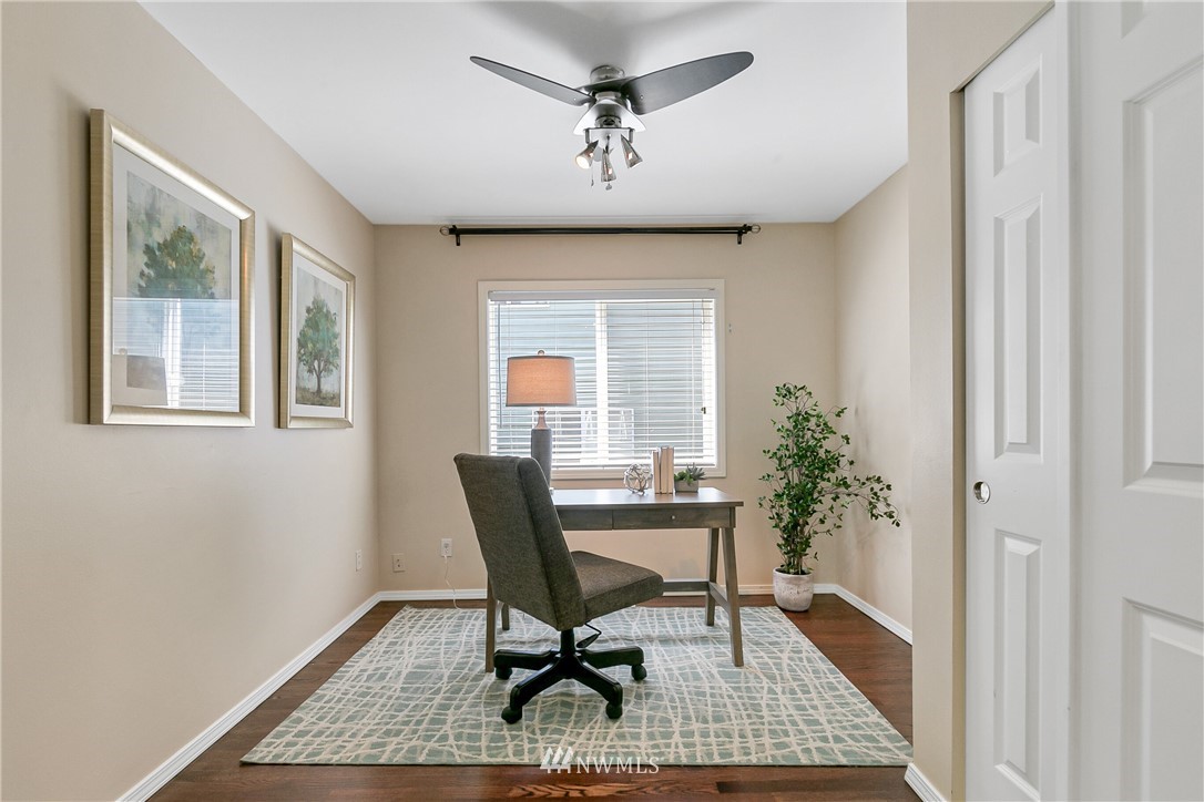1127 185th Place Southeast Bothell, WA 98012 - Photo 12 of 25 a workspace with furniture and a window