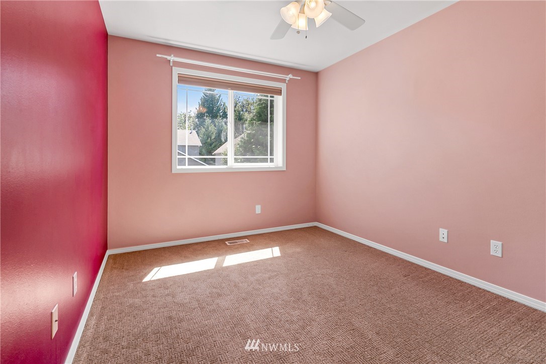 1127 185th Place Southeast Bothell, WA 98012 - Photo 19 of 25 an empty room with a window