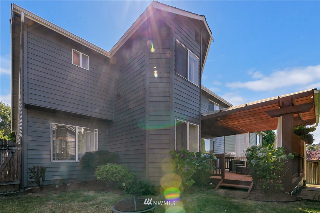 1127 185th Place Southeast Bothell, WA 98012 - Photo 25 of 25 a front view of a house with a yard
