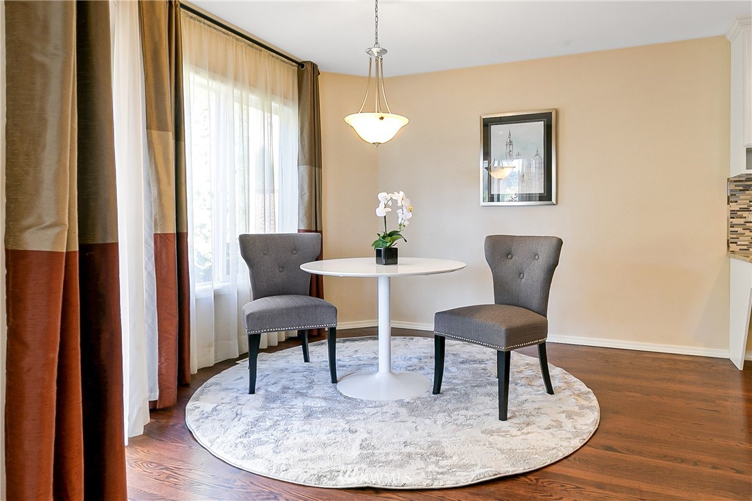 1127 185th Place Southeast Bothell, WA 98012 - Photo 9 of 25 a dining room with furniture and window