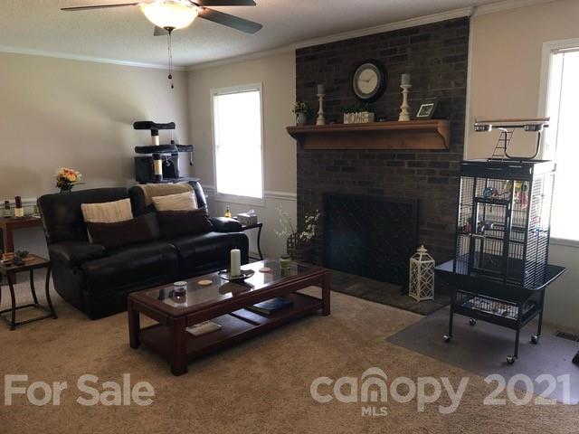 130 Lyn Road Salisbury, NC 28147 - Photo 4 of 15 a living room with furniture and a fireplace