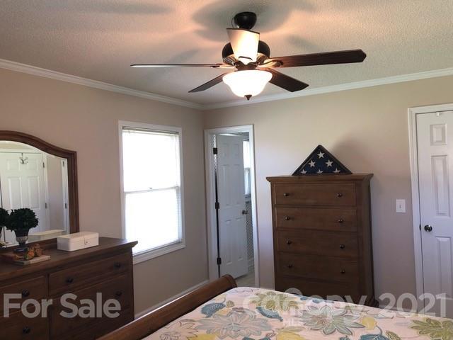 130 Lyn Road Salisbury, NC 28147 - Photo 8 of 15 a bedroom with a bed and a dresser