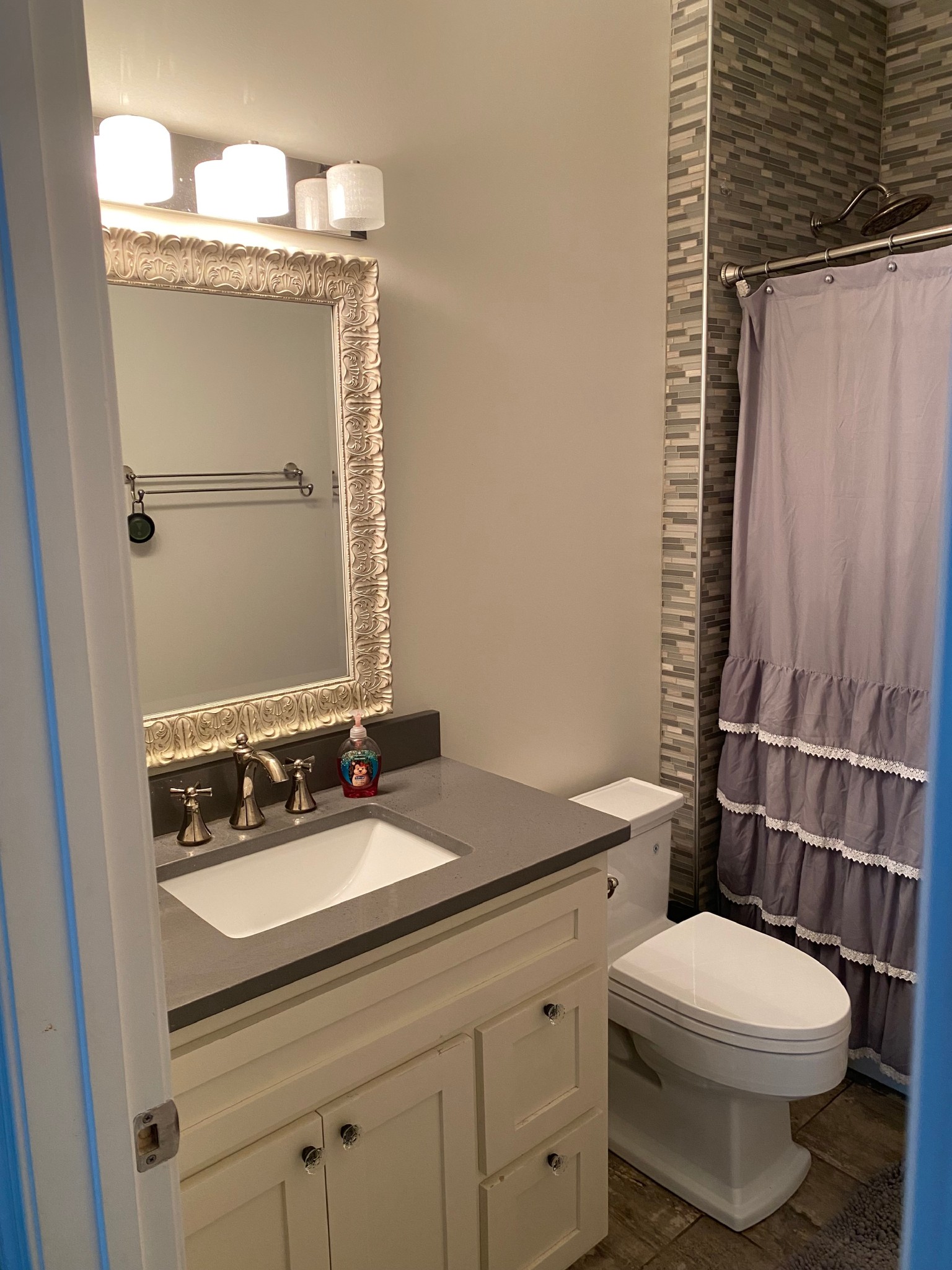 857 Hicks Cut Road Pulaski, TN 38478 - Photo 27 of 49 a bathroom with a sink a toilet and shower