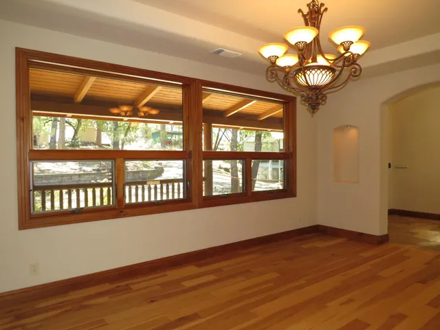 a spacious bathroom with a double vanity sink and a mirror