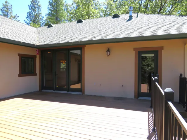 a view of a room with wooden walls