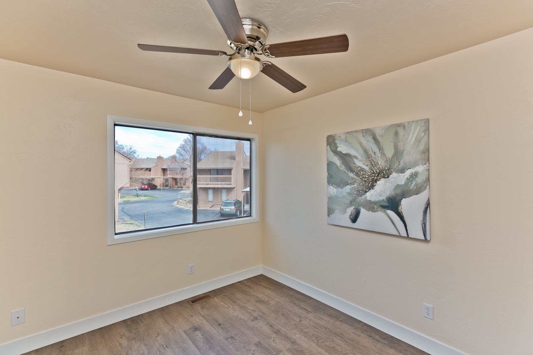 575-28 28 1/2 Road, Unit 44 Grand Junction, CO 81501 - Photo 16 of 39 a view of a big room with wooden floor and windows