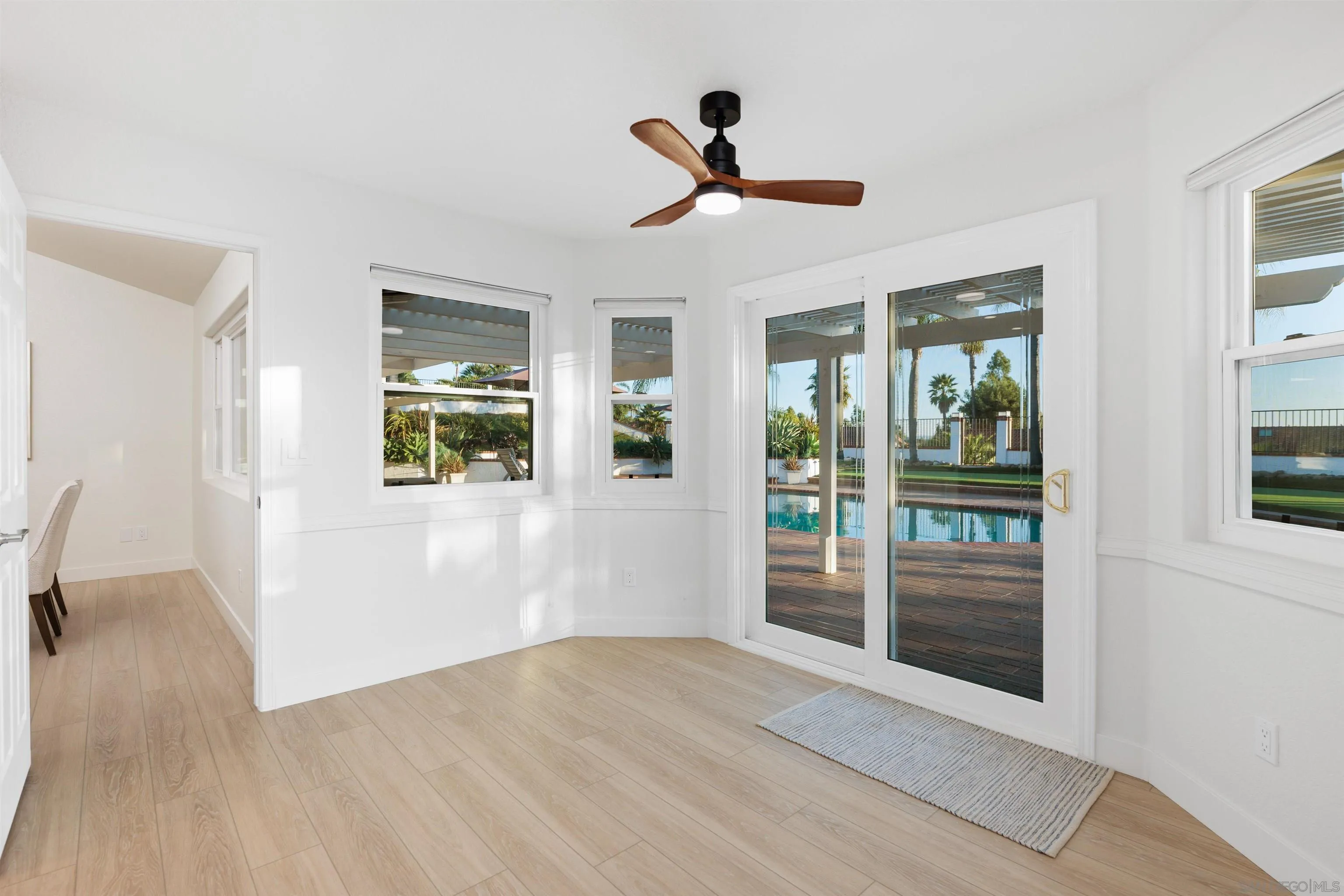 1611 Stoneridge Circle Escondido, CA 92029 - Photo 14 of 30 a view of empty room with wooden floor and fan