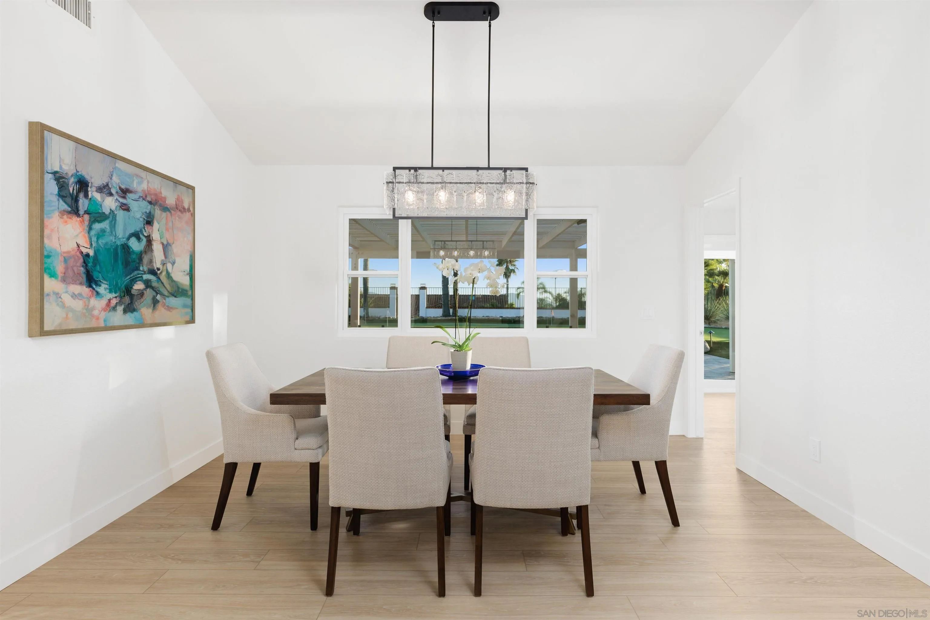 1611 Stoneridge Circle Escondido, CA 92029 - Photo 15 of 30 a view of a dining room with furniture wooden floor and chandelier
