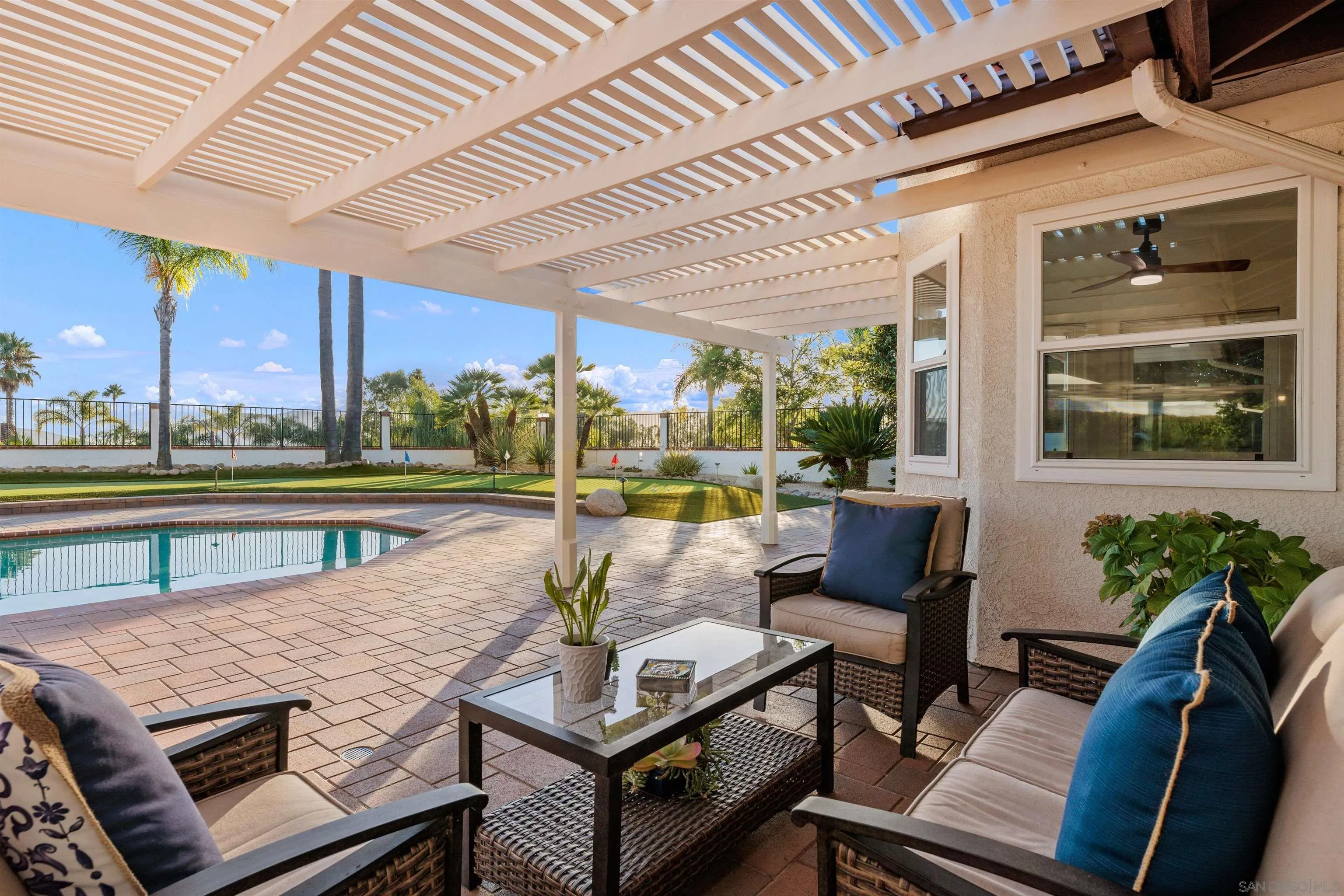 1611 Stoneridge Circle Escondido, CA 92029 - Photo 22 of 30 a view of a patio with table and chairs and potted plants
