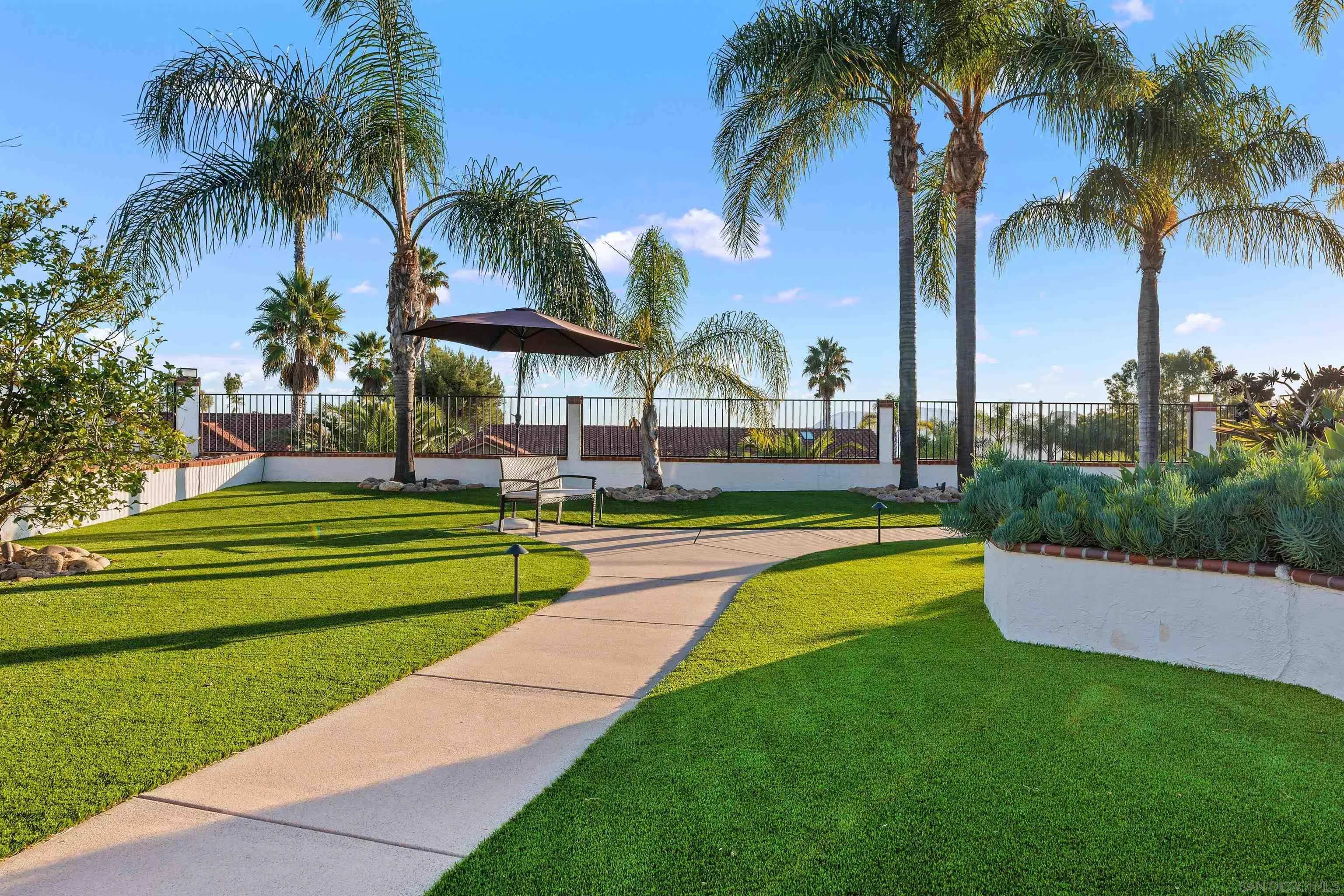 1611 Stoneridge Circle Escondido, CA 92029 - Photo 25 of 30 a garden view with palm trees