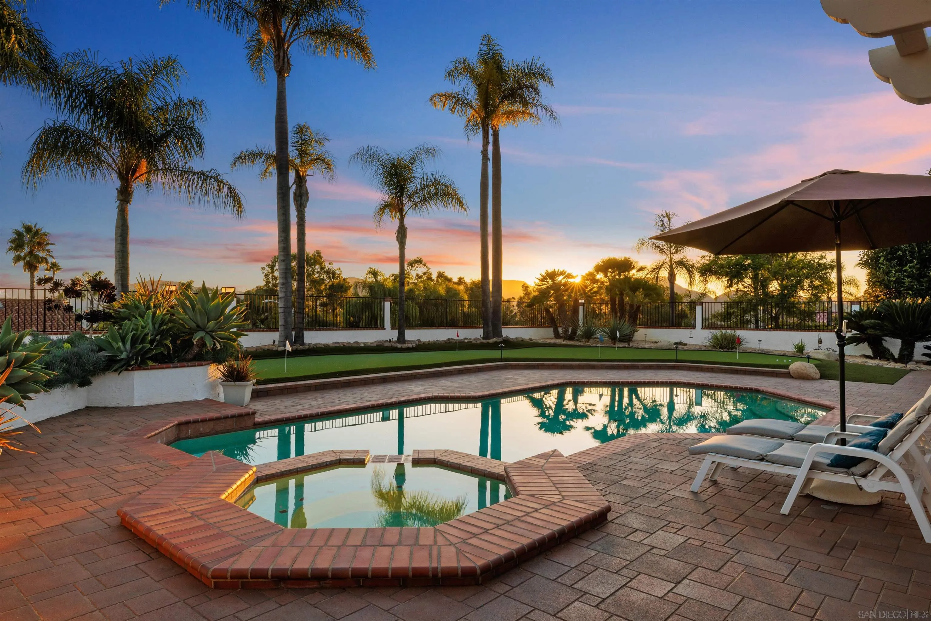 1611 Stoneridge Circle Escondido, CA 92029 - Photo 27 of 30 a view of a swimming pool with a table and chairs