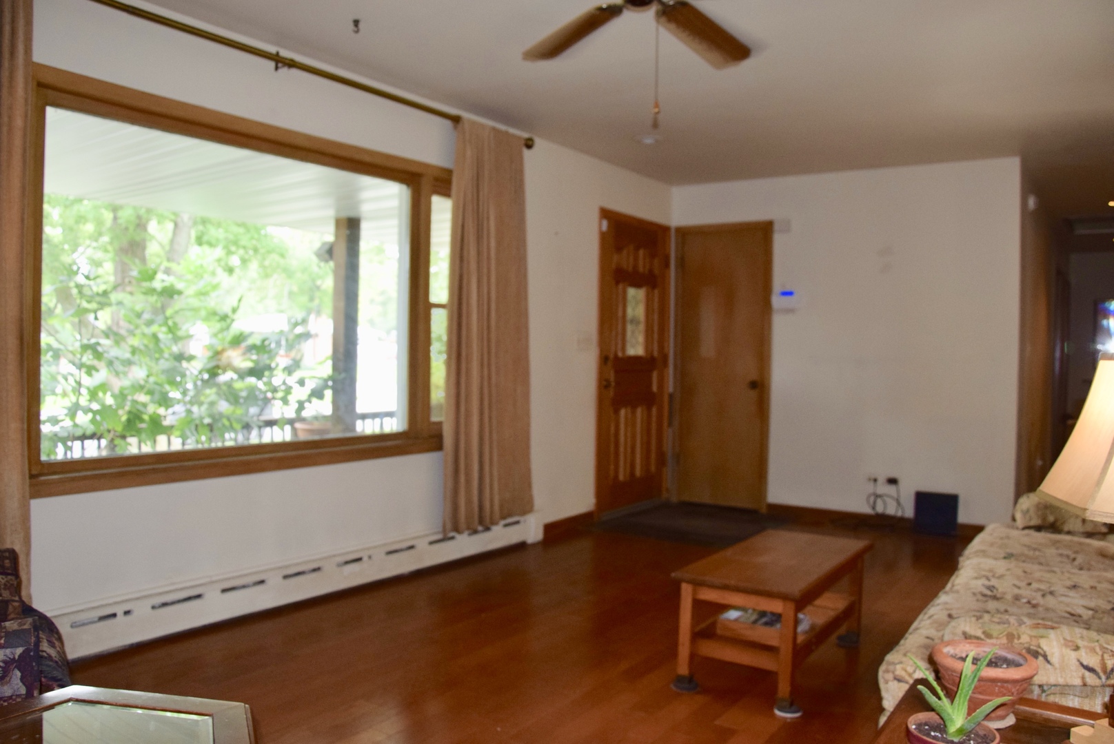3449 Phillips Avenue Steger, IL 60475 - Photo 7 of 25 a living room with furniture and a window