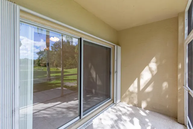 a backyard of a house with plants