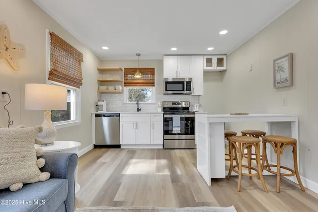 $630,000 | 111 Northeast 19th Street, Unit C & D, Oak Island, NC 28465