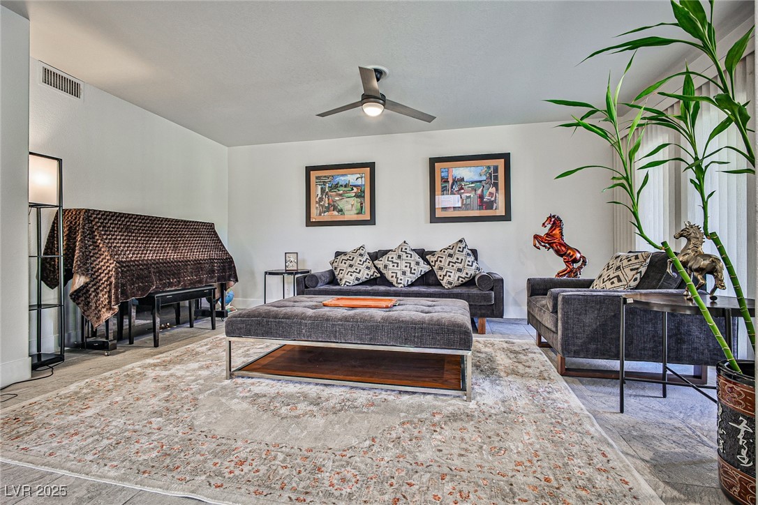 7772 Boca Raton Drive Las Vegas, NV 89113 - Photo 24 of 40 Living area with a ceiling fan