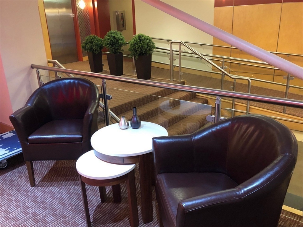 1600 Beacon Street, Unit 1012 Brookline, MA 02446 - Photo 3 of 27 a balcony with table and chairs