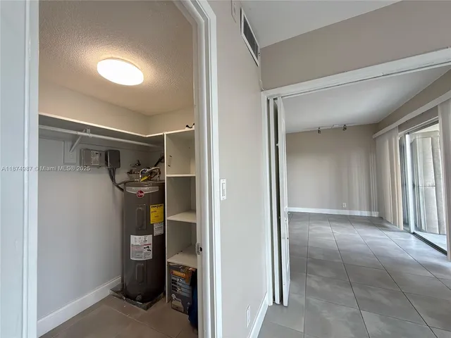 a view of a livingroom with furniture and a chandelier