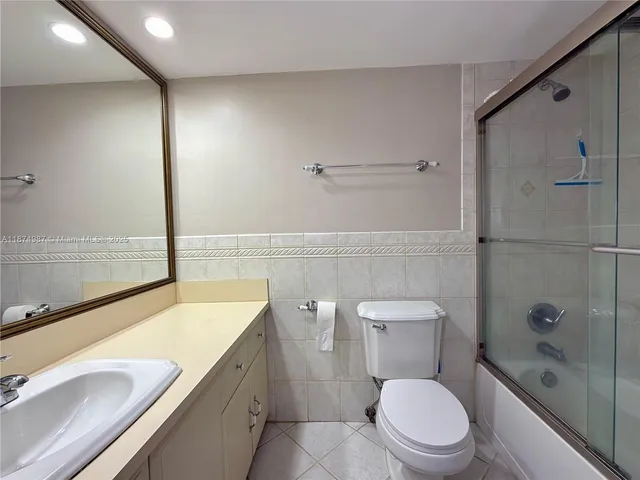 aerial view of a house with a yard