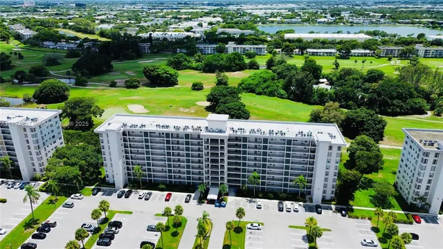 a view of a dining room with furniture and a wooden floor