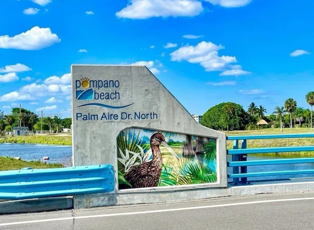a view of a dining room with furniture and window