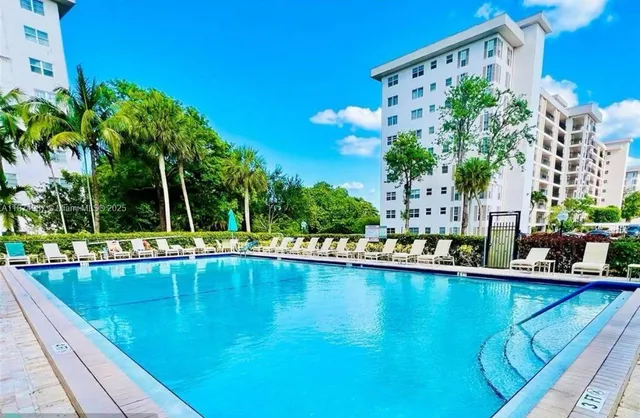a view of a garden with patio