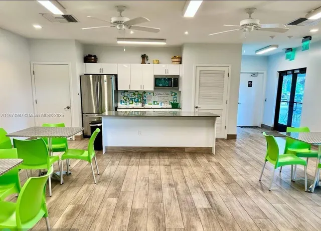 a view of park with a sign board