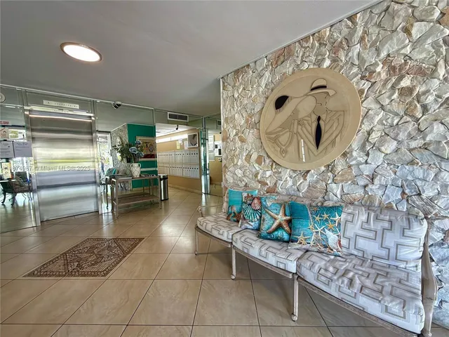 a view of a hallway with front door