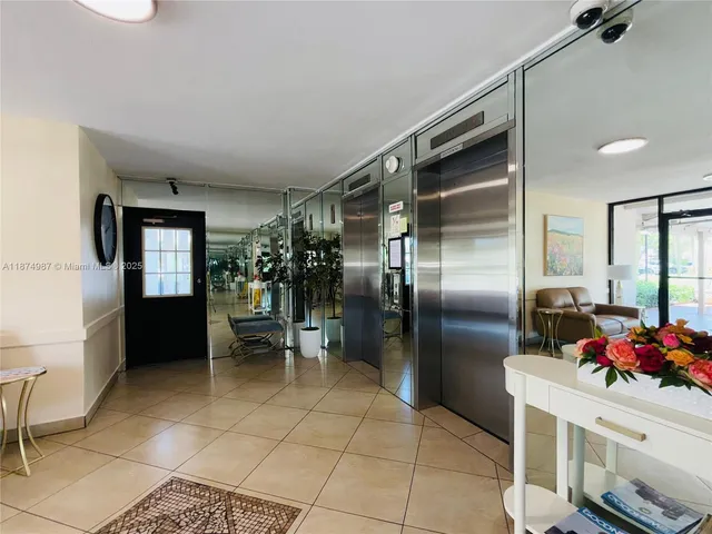 a view of a hallway with a livingroom