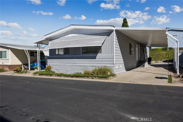 a view of a house with a street