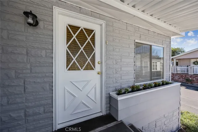 a front view of a house with stairs