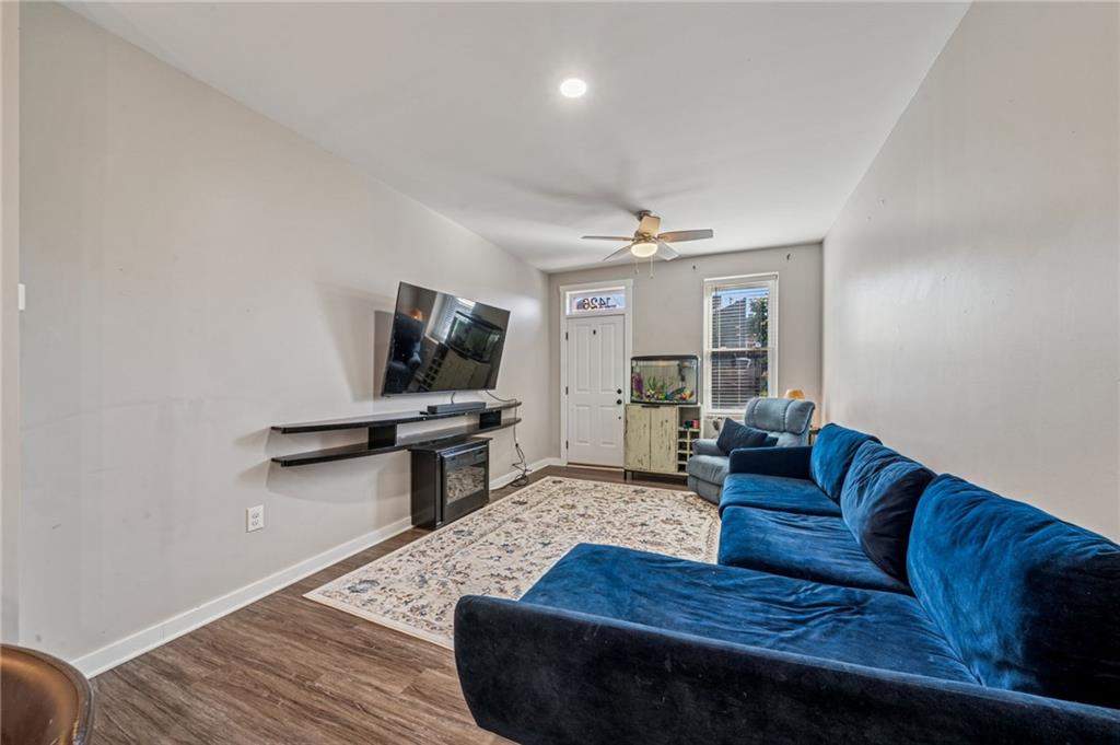 1426 Rush Street Pittsburgh, PA 15233 - Photo 12 of 30 a living room with furniture and a flat screen tv