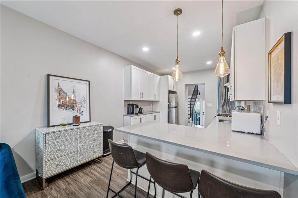 1426 Rush Street Pittsburgh, PA 15233 - Photo 14 of 30 a room with furniture and wooden floor