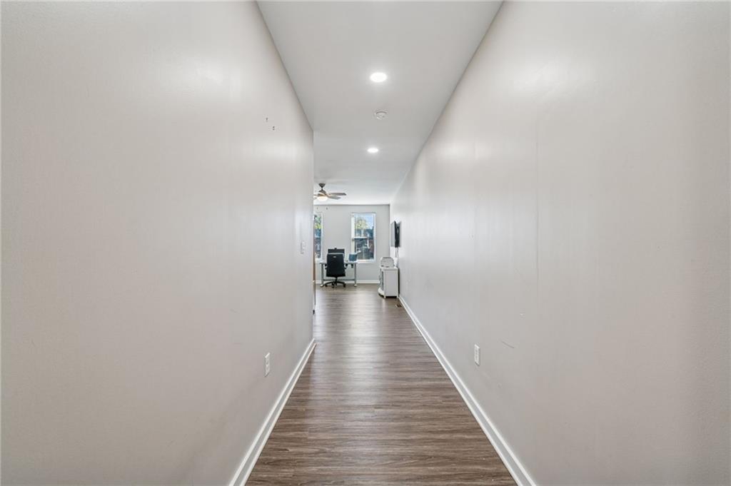 1426 Rush Street Pittsburgh, PA 15233 - Photo 24 of 30 a view of a hallway with wooden floor