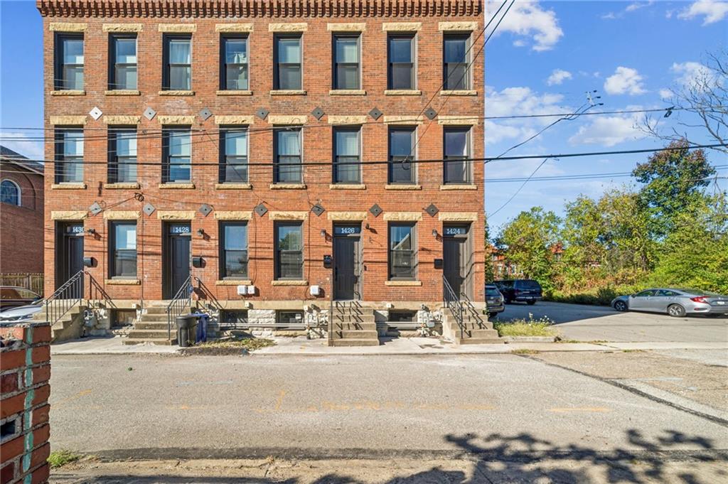 1426 Rush Street Pittsburgh, PA 15233 - Photo 3 of 30 a front view of a building with street view