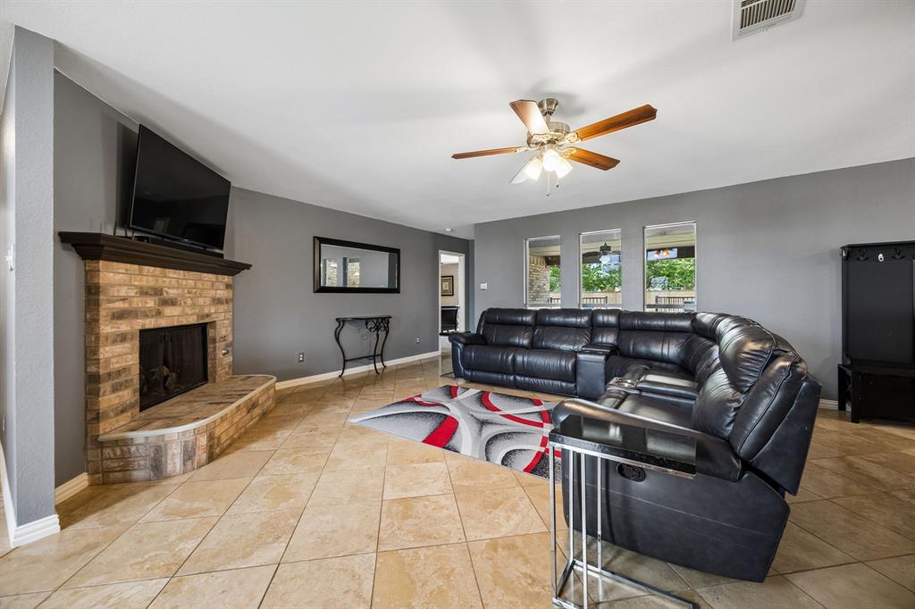 545 Rothschild Lane Murphy, TX 75094 - Photo 4 of 27 Large family room with fireplace