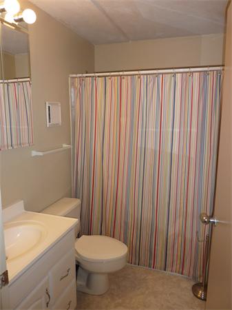 108 Peterborough Street, Unit 3H Boston, MA 02215 - Photo 5 of 6 a bathroom with a sink a toilet and shower
